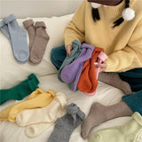 YM2354純色羊毛襪堆堆襪批發加厚保暖百搭月子襪中筒襪女