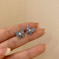 SX01661藍色水晶銀針花朵蝴蝶耳飾
