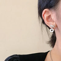 MY35180-925銀針不對稱蝴蝶結耳釘冷淡風銀色耳環小眾設計感高級時尚耳飾