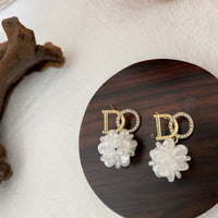 貝殼白花朵韓國新款森林系DO字母耳飾925銀針(E0479)